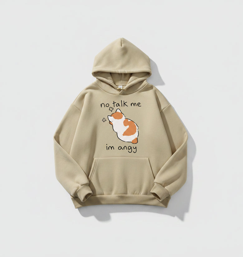 Beige hoodie with a cartoon dog and text on a casual setting