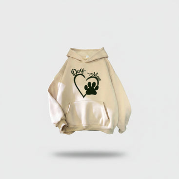 Beige hoodie with 'Dog Mom' and paw print design on a textured surface.