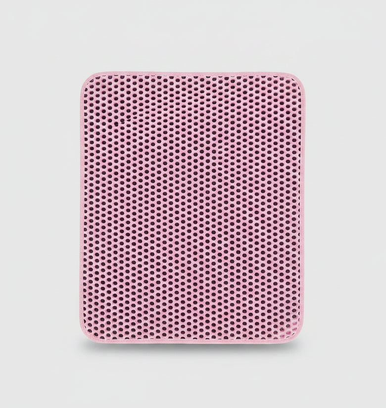 Pink cat litter box mat with text and images of different types of cat litter.