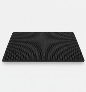 Cat litter mat with a cat walking on it, showing EVA double layer design.