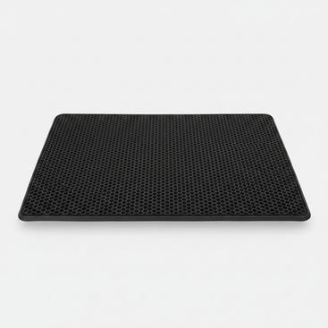 Cat litter mat with a cat walking on it, showing EVA double layer design.