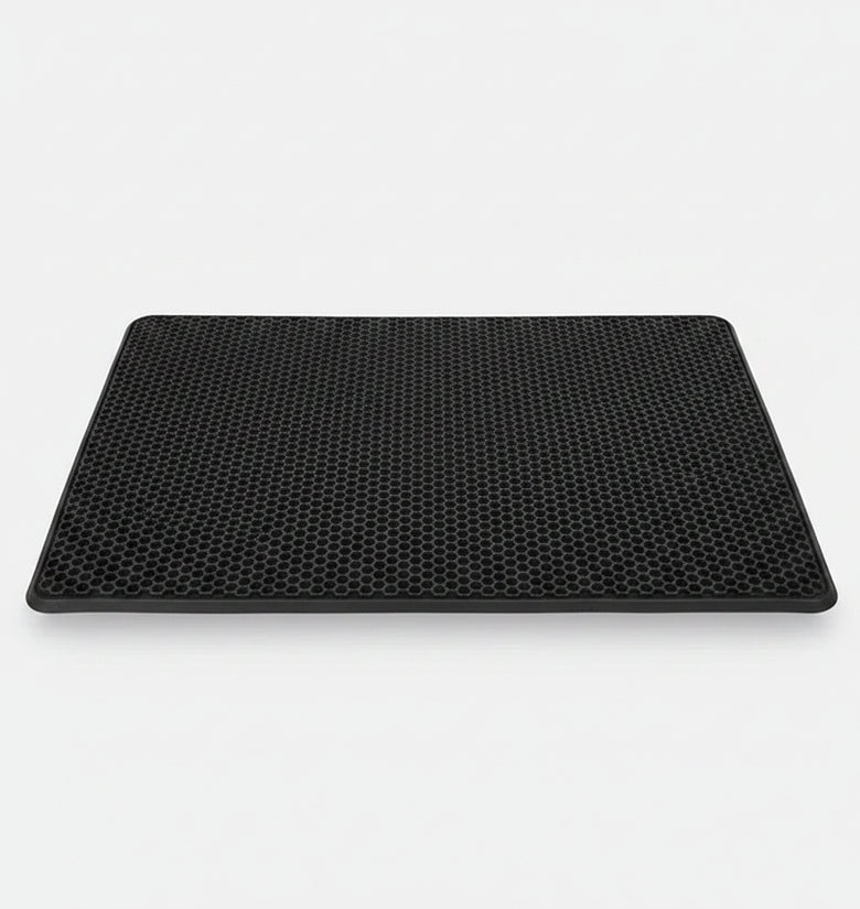 Cat litter mat with a cat walking on it, showing EVA double layer design.