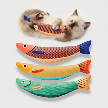 Three fish-shaped cat toys with a cat playing with one of them on a white background.