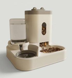 Pet feeding and water station with food and water containers on a wooden floor.