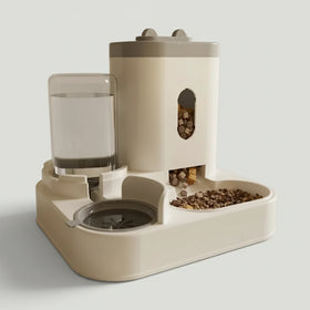 Pet feeding and water station with food and water containers on a wooden floor.