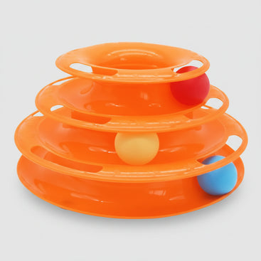 Orange plastic toy with three levels and colorful balls on a white background