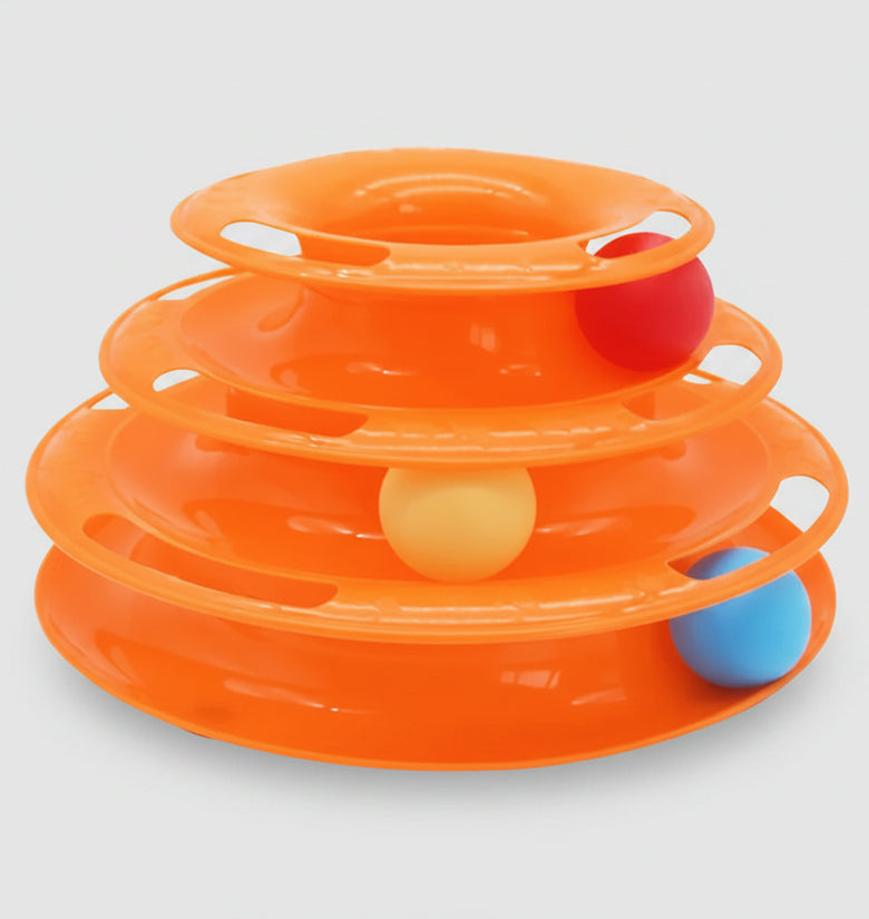 Orange plastic toy with three levels and colorful balls on a white background