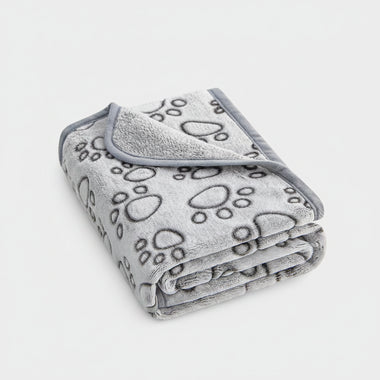 Gray blanket with paw prints on a white background