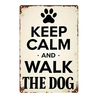 Vintage-style metal sign with paw print and text 'Keep Calm and Walk the Dog' on a white background.