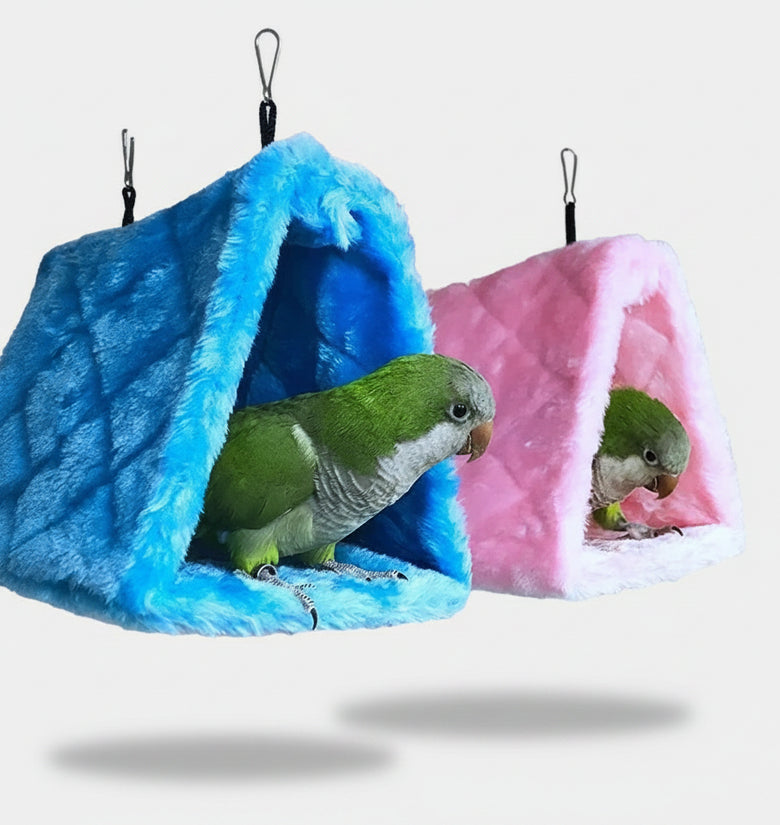 Two parrots in colorful bird nests with text 'Bird Cages & Nests'.